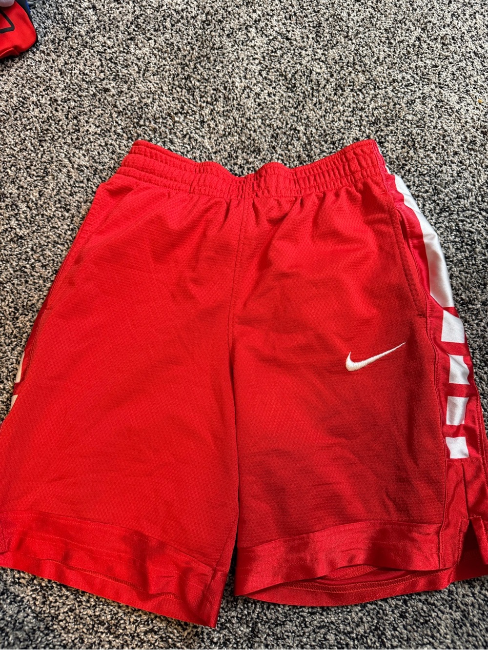 Nike Kids Red Mesh Athletic Shorts with White Swoosh